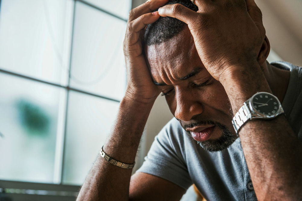 man with alcohol withdrawal headache