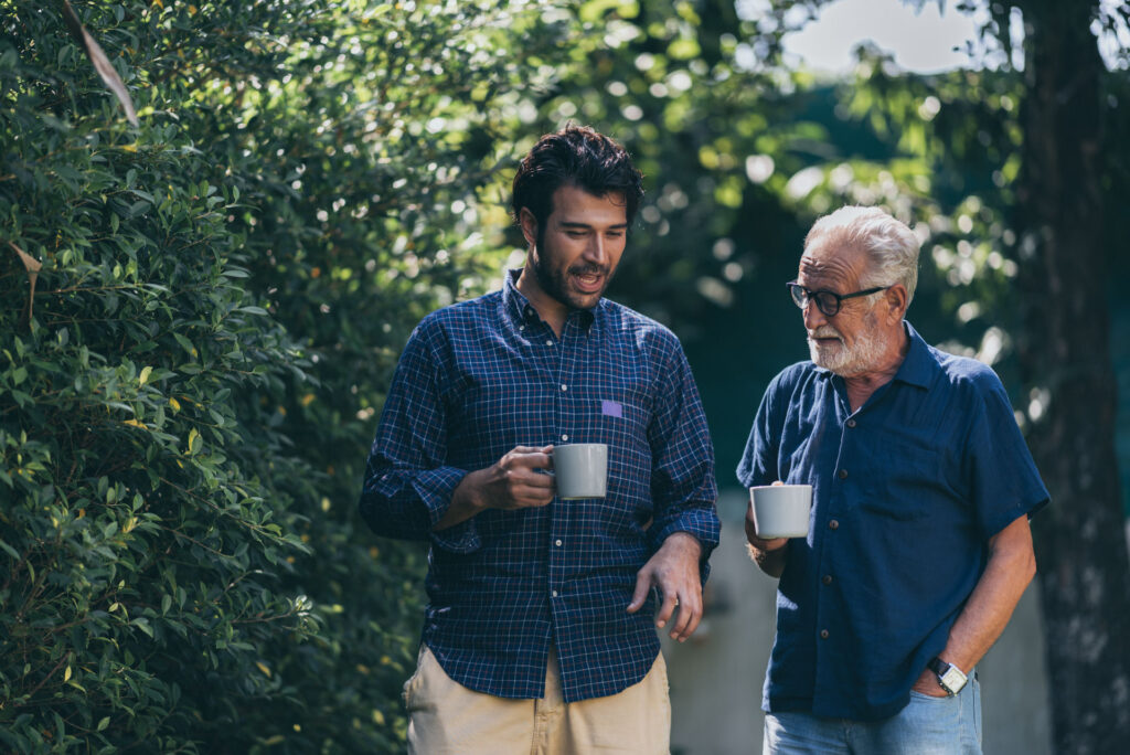two men walking outside
