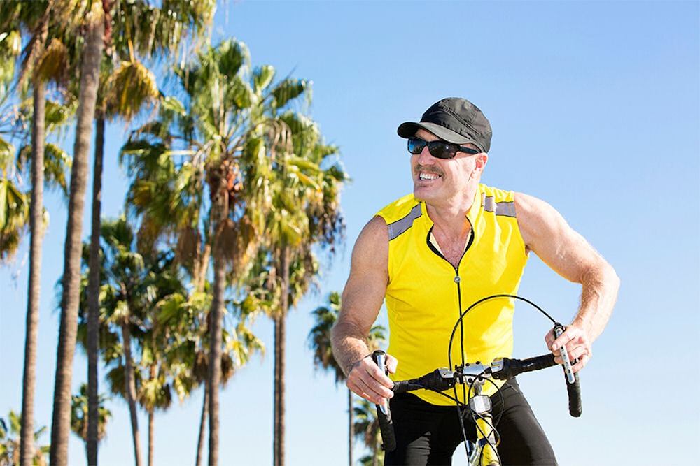 man riding a bike outside
