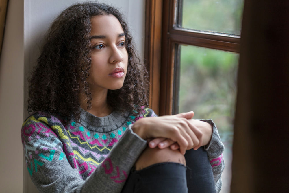 young woman experiencing silent panic attack